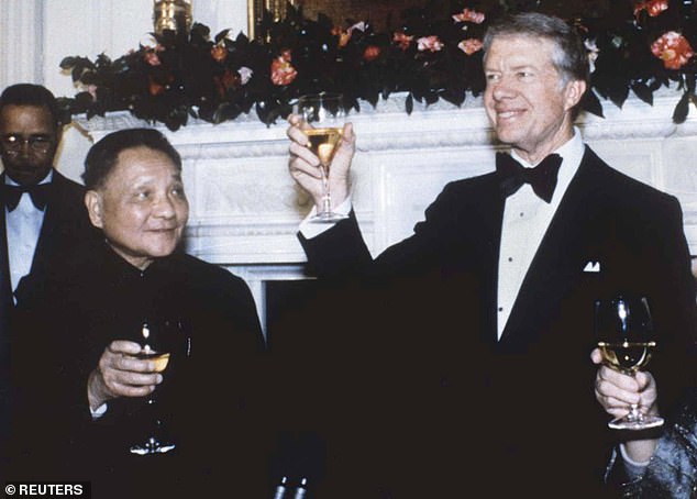 President Jimmy Carter toasts Chinese Vice Premier Deng Xiaoping during a state dinner at the White House in 1979