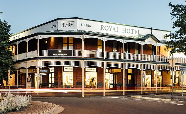 An eyewitness reported that the driver of the vehicle remained in his car for up to 10 minutes without moving after the crash at the Royal Hotel (pictured) in Daylesford