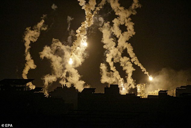 Israeli army flares light up the sky above the northern Gaza Strip