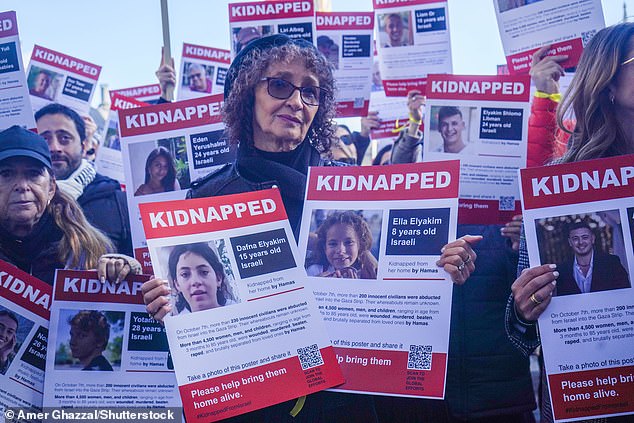 Many were draped in Israeli flags and holding posters reading 