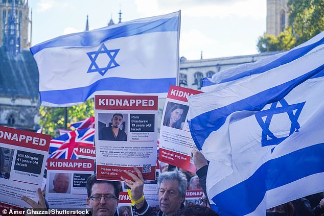 Emotional songs of peace rang out in Parliament Square as demonstrators gathered to sing the Israeli national anthem Hatikva – simply translated to 'the hope'