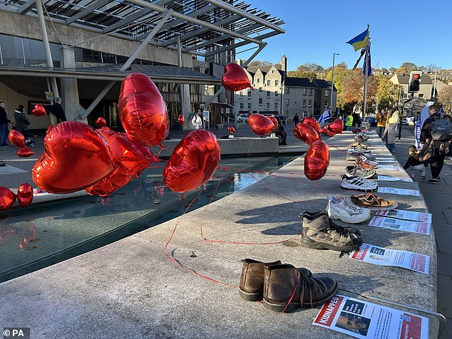 Elsewhere in Britain, supporters also gathered at a silent vigil outside the Scottish Parliament in Edinburgh to remember those being held hostage.