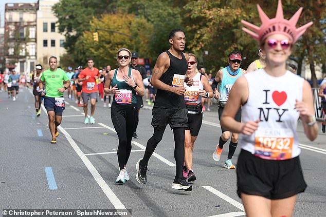 The pair finished the race together with a time of four hours, 14 minutes and 39 seconds