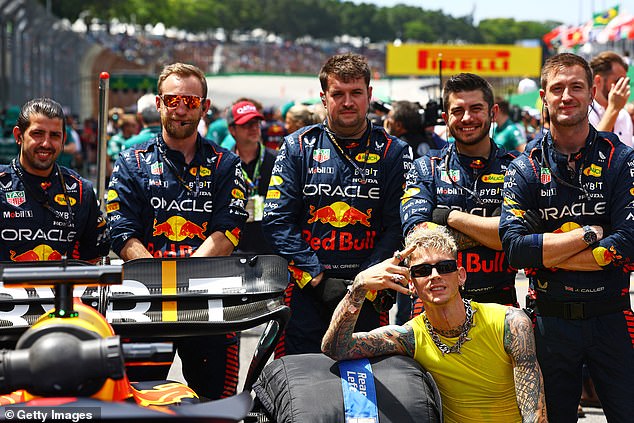 Team: Kelly said he was 'honoured' to attend Sunday's race (pictured with Red Bull racing team)