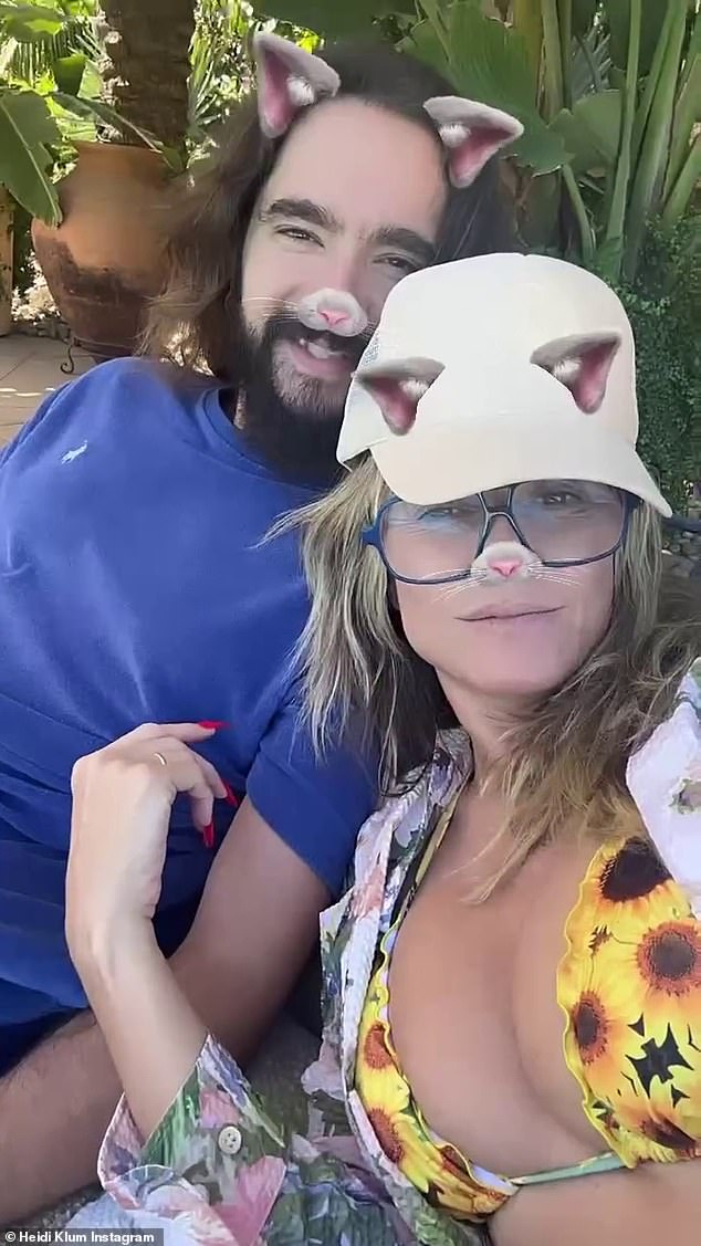 Cute: In another clip, she and husband Tom Kaulitz, 34, were seen lounging together and posing for the camera with the animal filter on