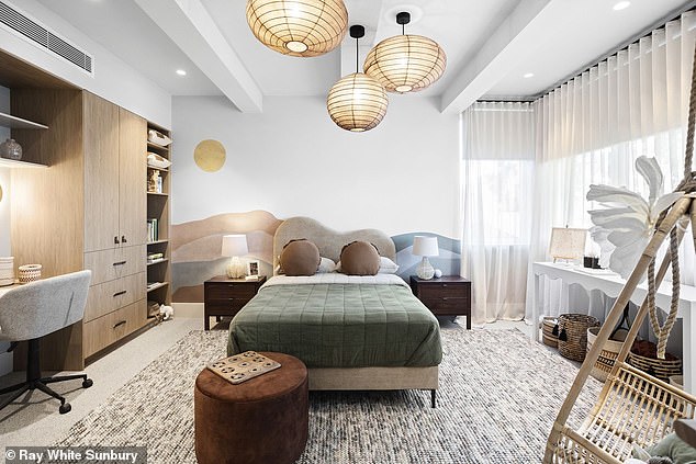 It broke the record for the suburb of Bayside, 17km from the CBD, which stood at $3.1 million in May 2021.  Pictured: one of four fantastic bedrooms