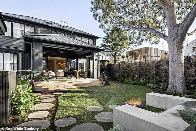 With a design inspired by Scandinavian and Japanese influences, the expansive path has vast open space and a luxurious atmosphere.  Pictured: the backyard