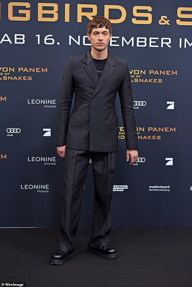 Brave: The English actor looked dapper as ever in a trendy oversized black suit, worn over a black t-shirt.  He paired the outfit with chunky black boots and a silver necklace