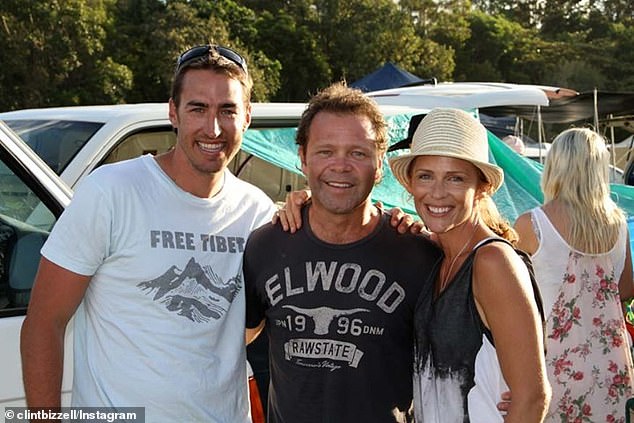 Bizzell (pictured with his wife and Australian country music star Troy Cassar-Daley) has been given a clean bill of health after having his prostate removed