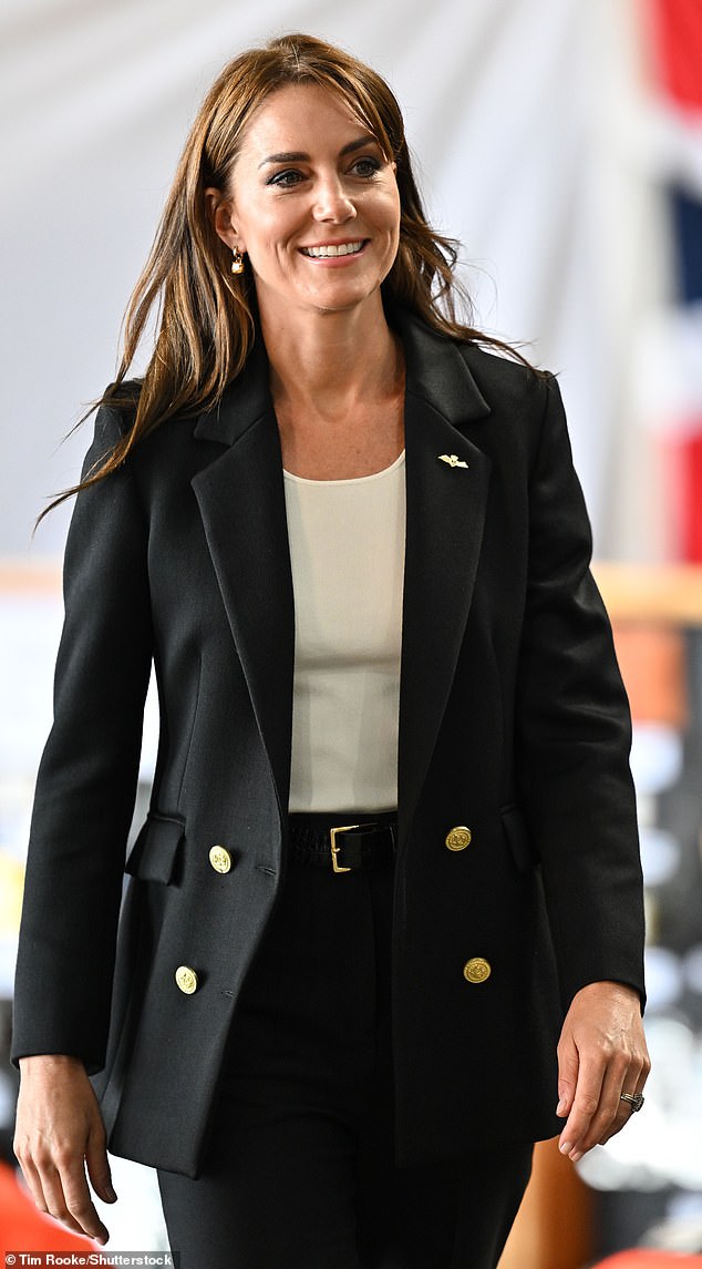 The Princess of Wales visits Royal Naval Air Station (RNAS) Yeovilton, one of the Royal Navy's two main air stations, in a black suit in September