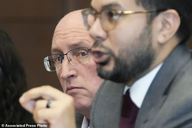 Crimo Jr.'s attorney George Gomez speaks with Judge George D. Strickland during the pre-trial hearing on Friday