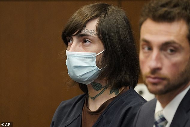 Robert E. Crimo III (pictured left) looks at Judge Victoria A. Rossetti as he listens to Judge Victoria A. Rossetti during a hearing in Lake County District Court Wednesday, August 3, 2022