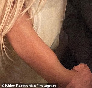 Interesting: The photo showed Kris and Khloe holding each other and smiling – but Khloe's arm inexplicably collapsed inward above her elbow