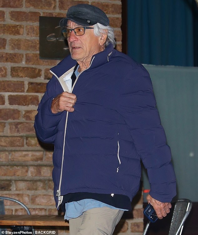 De Niro is pictured in Manhattan on November 3.  Robinson's case against him continues