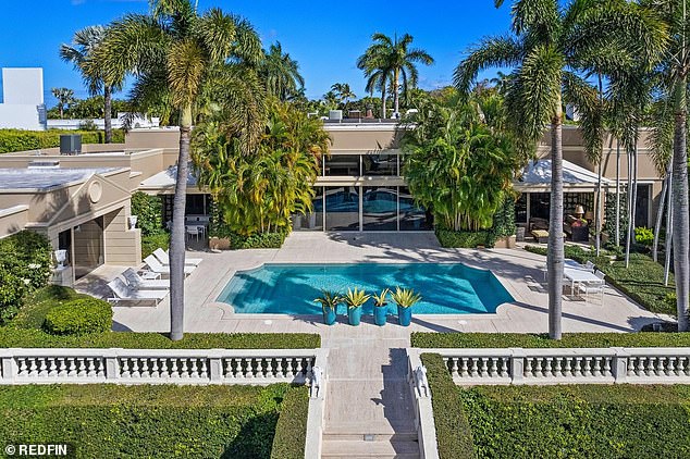 Data from real estate portal Redfin shows that the average sales price of a luxury US property rose to $1.1 million in the third financial quarter.  Pictured: A $50 million Palm Beach mansion in Florida.  It was the fifth most expensive home sale in the US between July and September