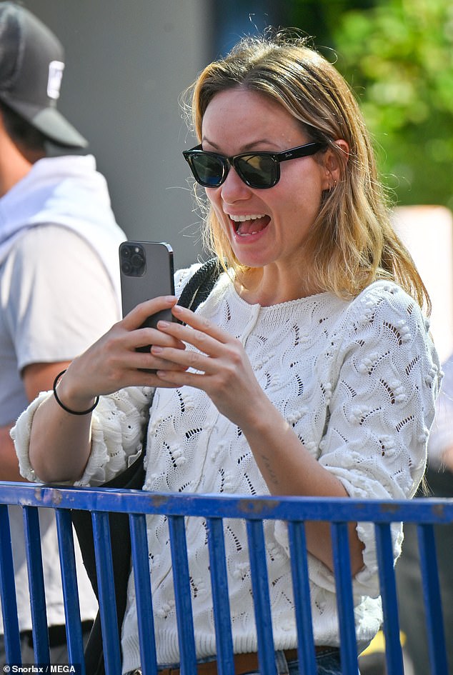 Adorable: Olivia was the proud mother through and through as she filmed her daughter taking a ride at the fair