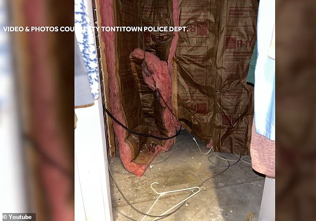 Photos from Tontitown police show the small compartment with open insulation where the child was hidden