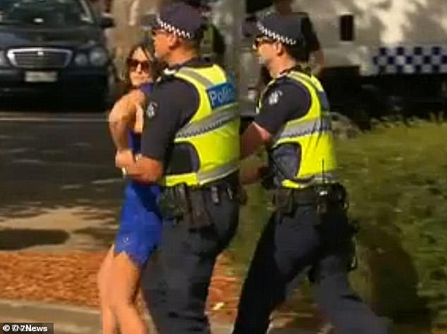 Finn, then 24, sheepishly turned and looked back at the media before she was quickly arrested and later fined $800 for the shocking attack