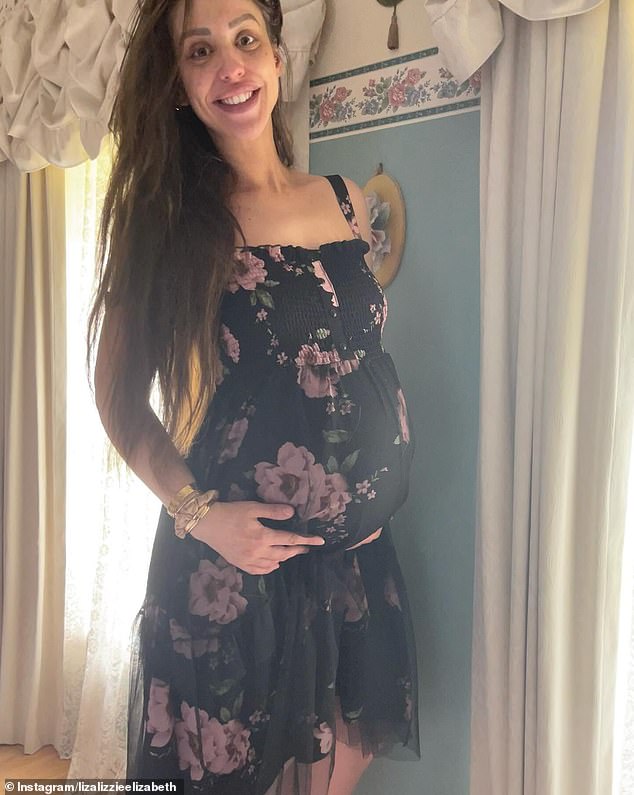 Elizabeth looked radiant in the photos, lovingly touching her baby bump