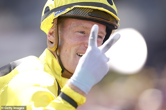 The jockey then made a two-finger gesture that he immediately regretted