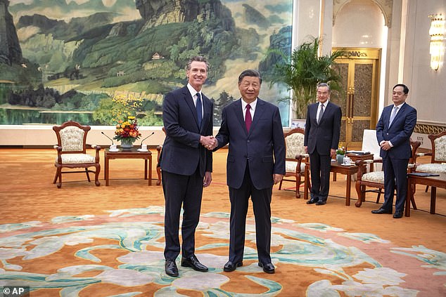 “Divorce is not an option,” tweeted Gavin Newsom's official account as California's governor roamed China.  Newsom is seen with Chinese President Xi Jinping at the Great Hall of the People in Beijing on October 25