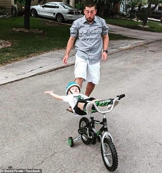 There he goes!  This poor toddler took a punch in the air before taking an awkward – and we predict painful – backwards fall