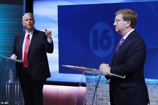 Brandon Presley (left) debates Republican Mississippi Gov. Tate Reeves (right).  Presley has attempted to link Reeves to a scandal involving former Green Bay Packers player Brett Favre