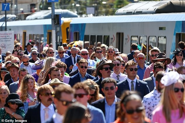 Punters are flocking to Flemington to watch the action in the race that holds the nation back