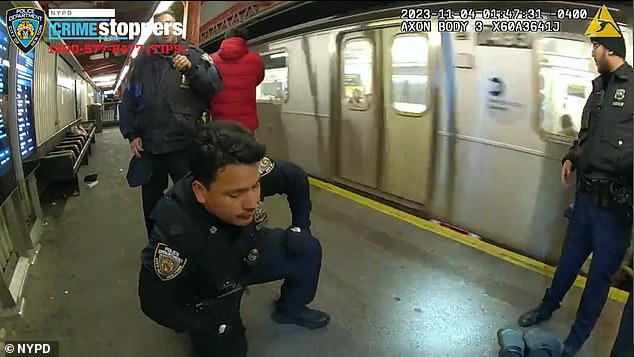 With the help of a good Samaritan, officers were able to get the man to safety just before the train roared past.