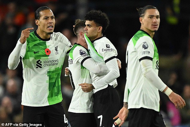 Liverpool were held to a disappointing draw against Luton, although it could have been worse when Luis Diaz (centre) scored an injury-time equalizer