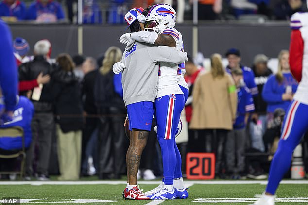 Buffalo Bills safety Damar Hamlin (3) hugs Buffalo Bills wide receiver Stefon Diggs on Sunday