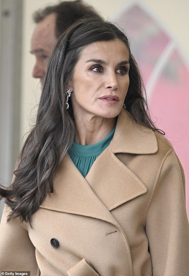 Letizia's face was a picture of nude perfection, opting for just a subtle pink lip and a touch of mascara