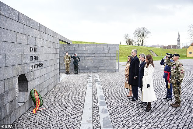 The royals appeared focused as they walked the grounds during their visit