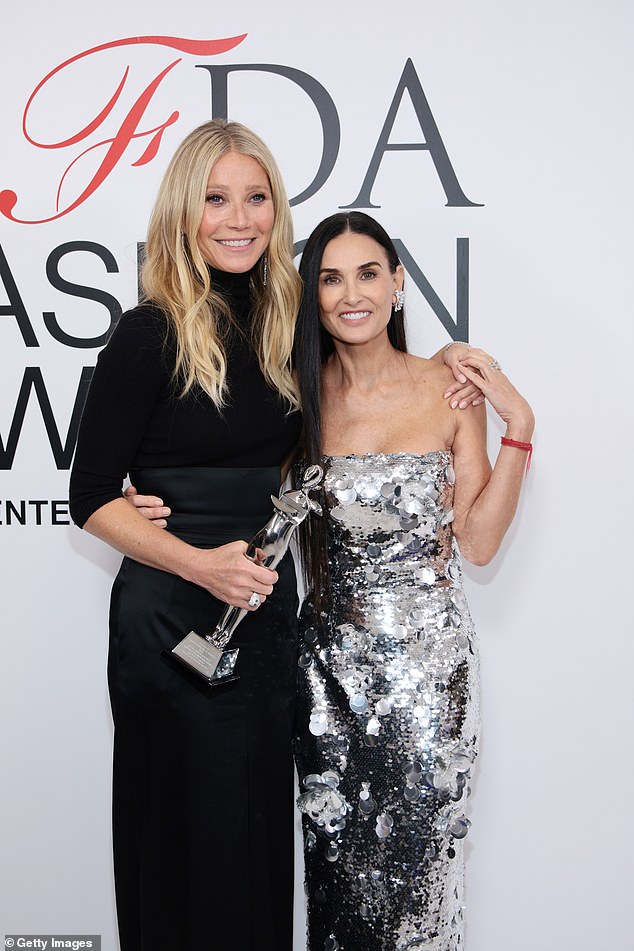 More Moore: Moore presented Paltrow with an innovative award for her work on Goop's advancements in technology and branding.  Since Goop was founded in 2008, the company has expanded into clothing and jewelry