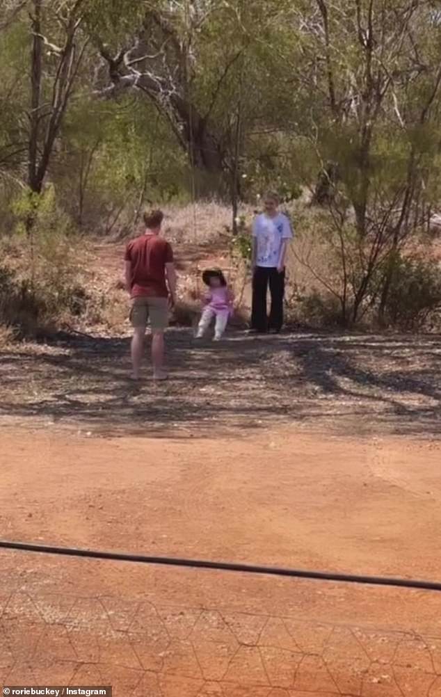 Robert and Rorie, both 19, looked every bit like potential parents as they pushed a playful Grace on a swing near their Queensland home.  Pictured