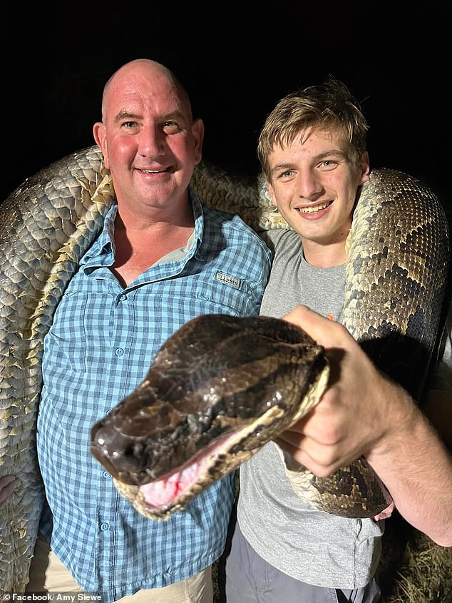 Elfenbein and his son Cole were part of the team that brought down the 17-foot, 2-inch long snake, which weighed just under 200 pounds