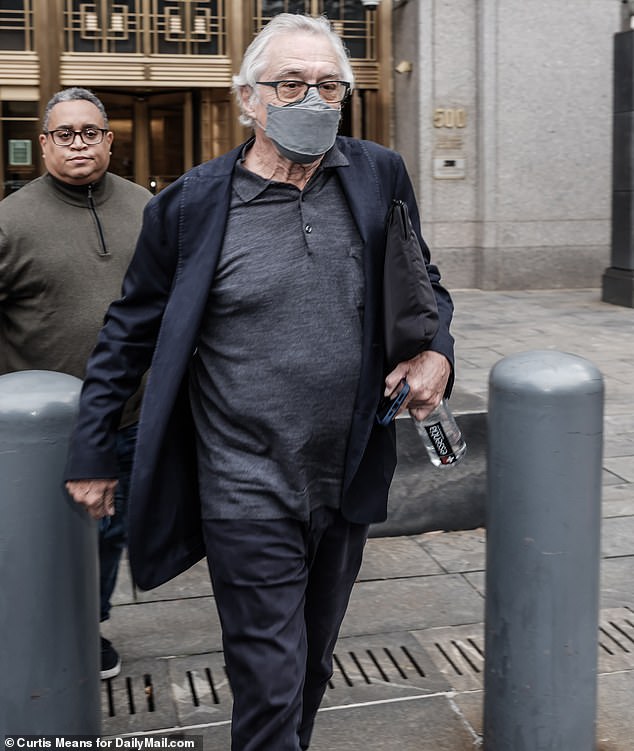 De Niro leaves the court last Thursday.  Robinson is suing him for $12 million, claiming he is a sexist, retaliatory boss.  He denies the allegations and is suing her for $6 million