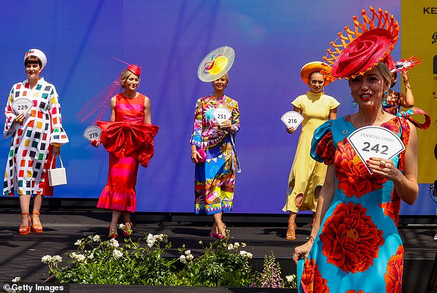 A stunning parade of a kaleidoscope of colors took to the Fashion on the Field stage where the best dressed and most stunning millinery was awarded