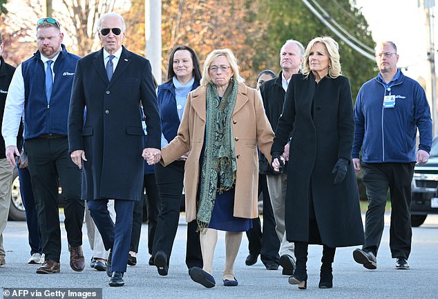 President Joe Biden and first lady Jill Biden walk with Maine Governor Jane Mills in Lewiston, Maine, on Friday