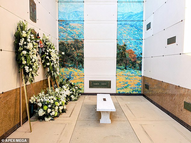 Tributes: The Friends star was buried Friday during a private funeral service at Forest Lawn Church of the Hills in Los Angeles, with a flower arrangement left behind