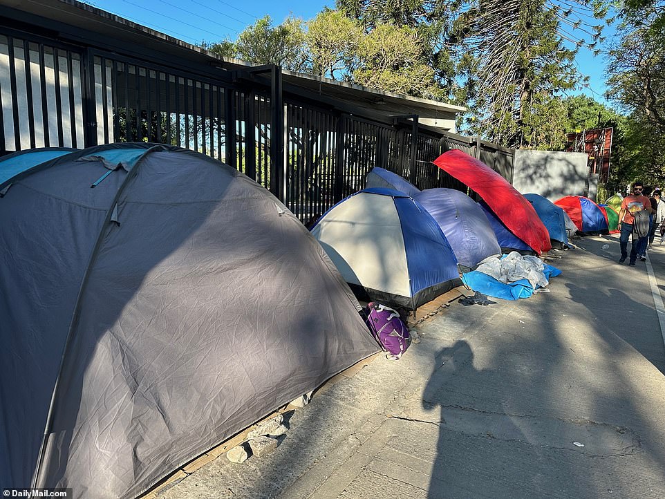 The small two-person tents are pictured outside the stadium.  Fans complained that supplies for friendship bracelets, which are popular with the fanbase, have completely sold out in Buenos Aires