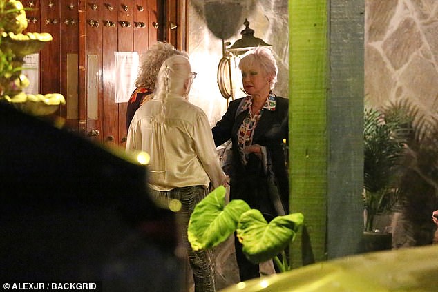 Chatting: Lauper was spotted chatting at the star-studded bash