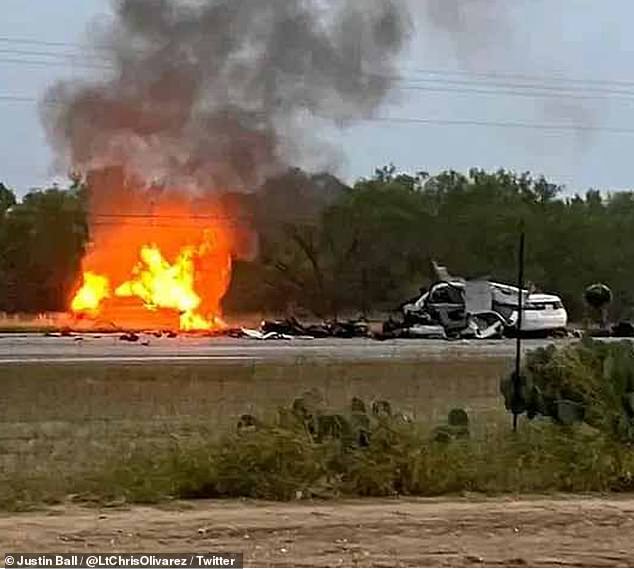 While the crash was still being investigated, it killed everyone involved, police confirmed, and also caused an explosion at the scene that was captured in a photo.  The car on fire was the suspected smuggler's SUV, but police would not say whether the migrants were still alive when the fire broke out