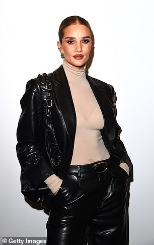 Iconic: she combined her leather pants with a statement jacket