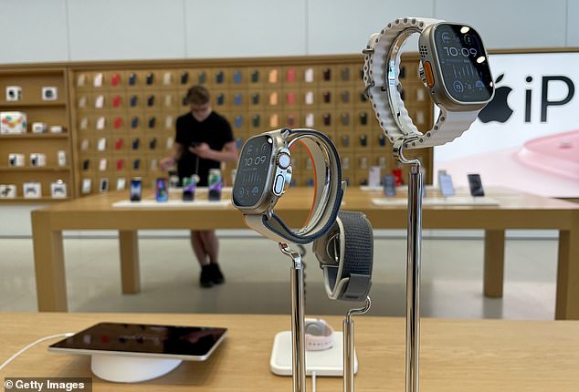 Above, two Apple Watches are on display at the Apple Store in Corte Madera, California this month