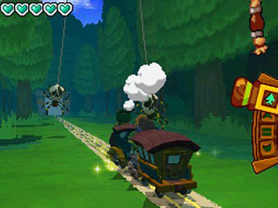 The train from Zelda: Spirit Tracks chugs along towards a spider whose health meter shows four hearts