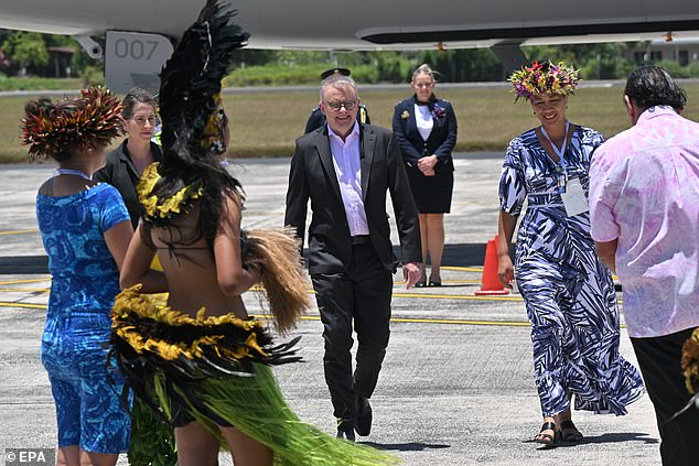 The Australian Prime Minister has ignored criticism of his intensive travel schedule of late, landing in Rarotonga on Wednesday on a direct flight from China