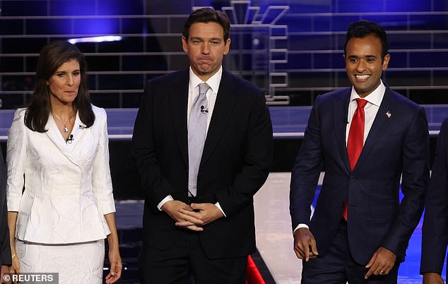 The top three contenders on stage at Wednesday's Republican presidential primary debate came down with fire against Donald Trump, RNC Chair Ronna McDaniel, the moderators and each other as tensions ran high from the start.  Photo from left: Nikki Haley, Ron DeSantis, Vivek Ramaswamy