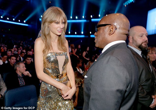 Reid has had a successful career in music (pictured speaking to Taylor Swift at the American Music Awards in 2013)