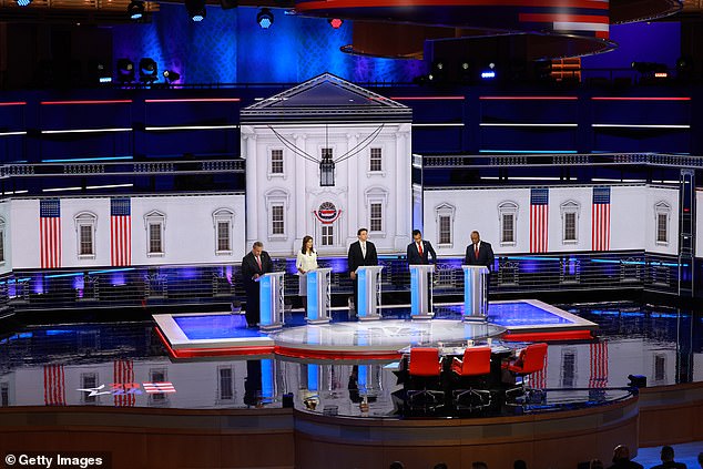 The contenders lined up in front of the White House backdrop at the Adrienne Arsht Center for the Performing Arts in Miami, Florida, on Wednesday evening.